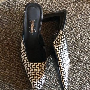 Black and white slip on heels